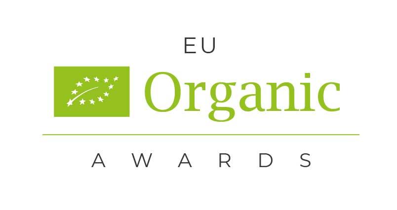 Vihreä koivunlehti merkki ja tekstit EU Organic Awards